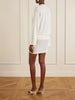 Knotted perforated jersey mini dress